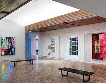 A gallery space displaying artworks